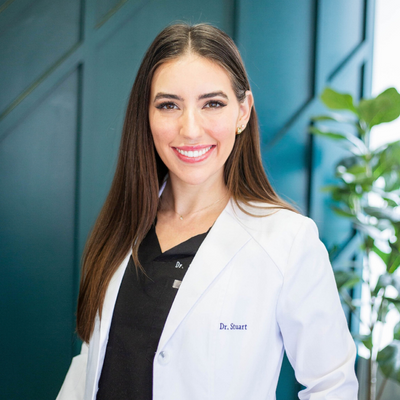 closed up portrait of Dr. Sarah Stuart, DDS Cosmetic & Family Dentist at The Village Dentistry Houston, TX