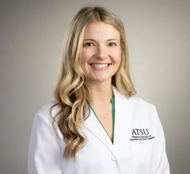 Dr. Lindborg, dentist at ATSU in Houston, smiles in professional portrait.